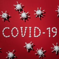 Concept of covid 19 in red background