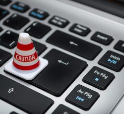 White caution cone on keyboard